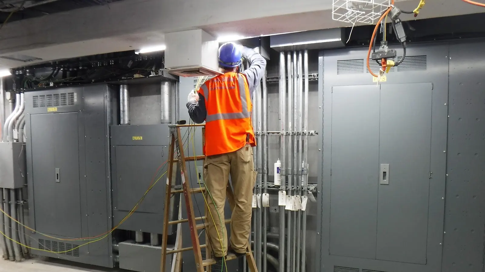 Velocity Electrical electrician working on commercial switchboards